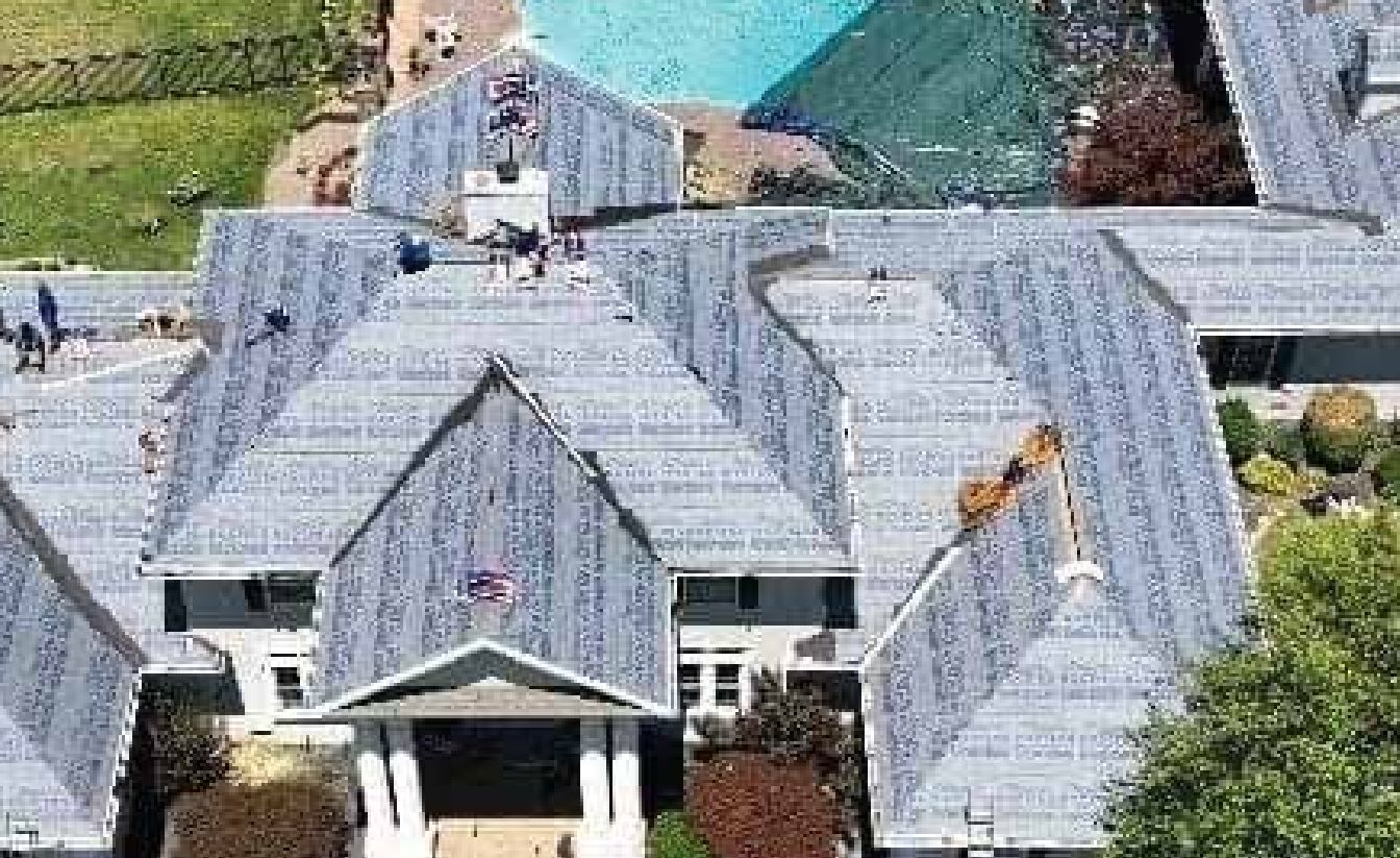 Aerial view of a Miller Construction residential re-roof in progress